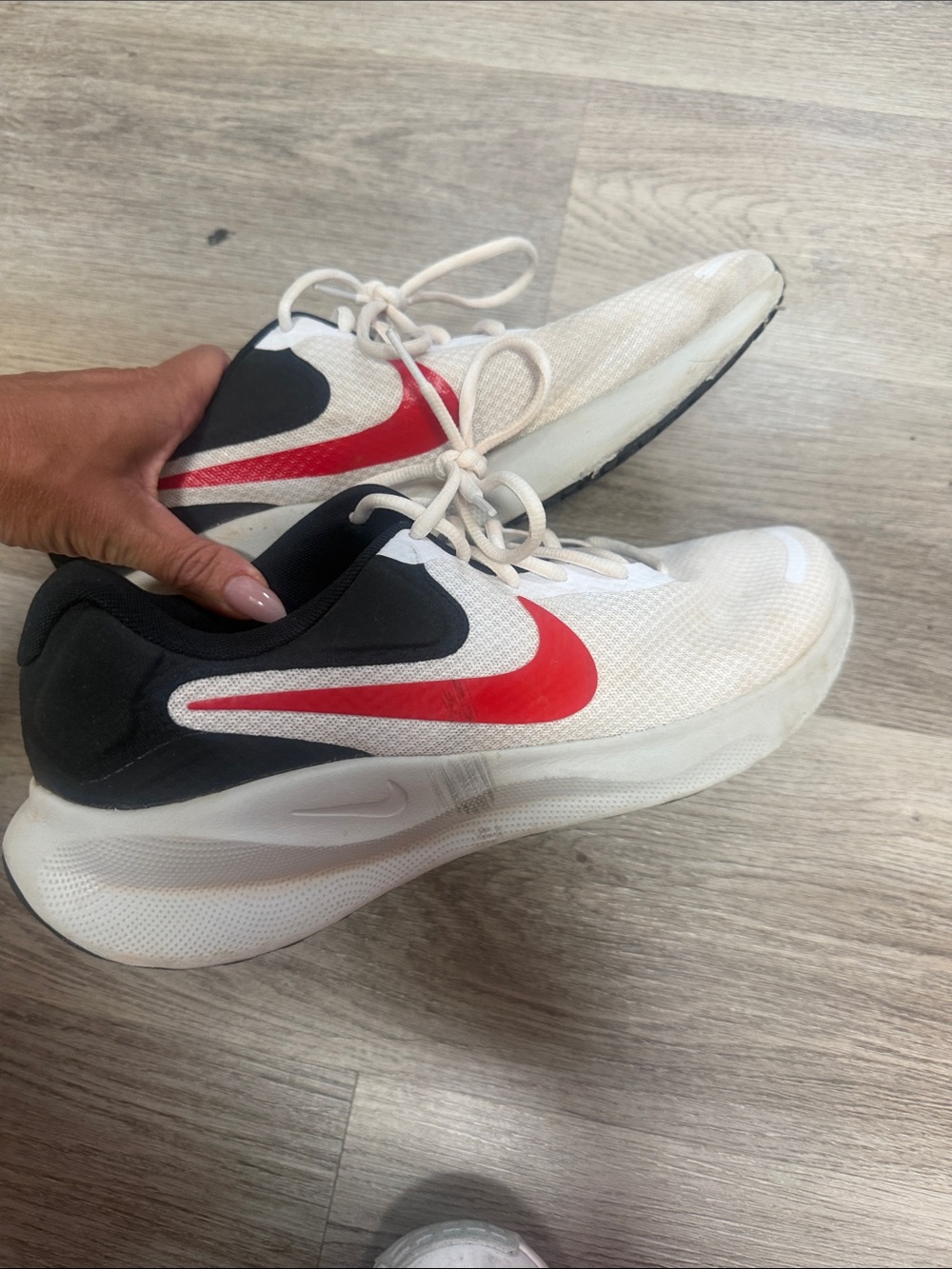 Nike White and Black Running Shoes with Red Swoosh